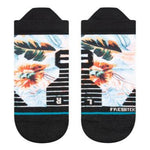 Stance Flowerful Performance Poly Tab Socks 2024 - A pair of white socks with a colorful floral pattern and orange, blue, and green flowers.