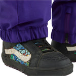 Airblaster Women's Nai Freedom Boss Pant 2025 - Black snow pants with a subtle pattern of small, light blue and green shapes on the side.