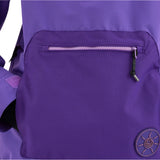 Airblaster Women's Nai Freedom Shell Pullover 2025 - A purple pullover with a zipper on the chest and two zippered pockets at the waist.