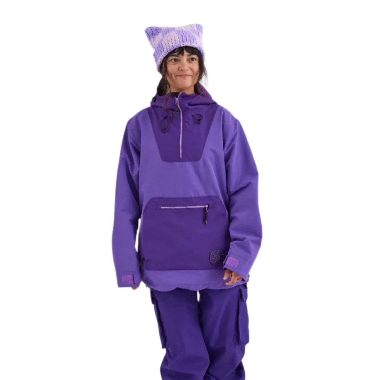 Airblaster Women's Nai Freedom Shell Pullover 2025 - A purple pullover with a hood and zipper, featuring a large front pocket with a zipper.