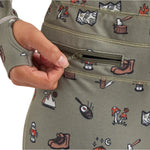 Airblaster Women's Hoodless Ninja Suit 2025 - A sage green onesie with a repeating pattern of brown and white snowboard boots, featuring a zipper on the front.