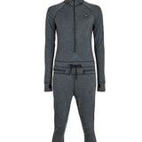 Airblaster Women's Merino Ninja Suit 2025 - A heathered grey women's full-body suit with a hood and thumbholes, featuring a small embroidered logo on the left chest.