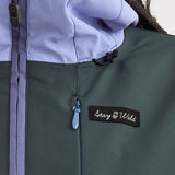 Airblaster Women's Stretch Freedom Suit 2025 - A black and white suit with a bold, geometric pattern on the pants.