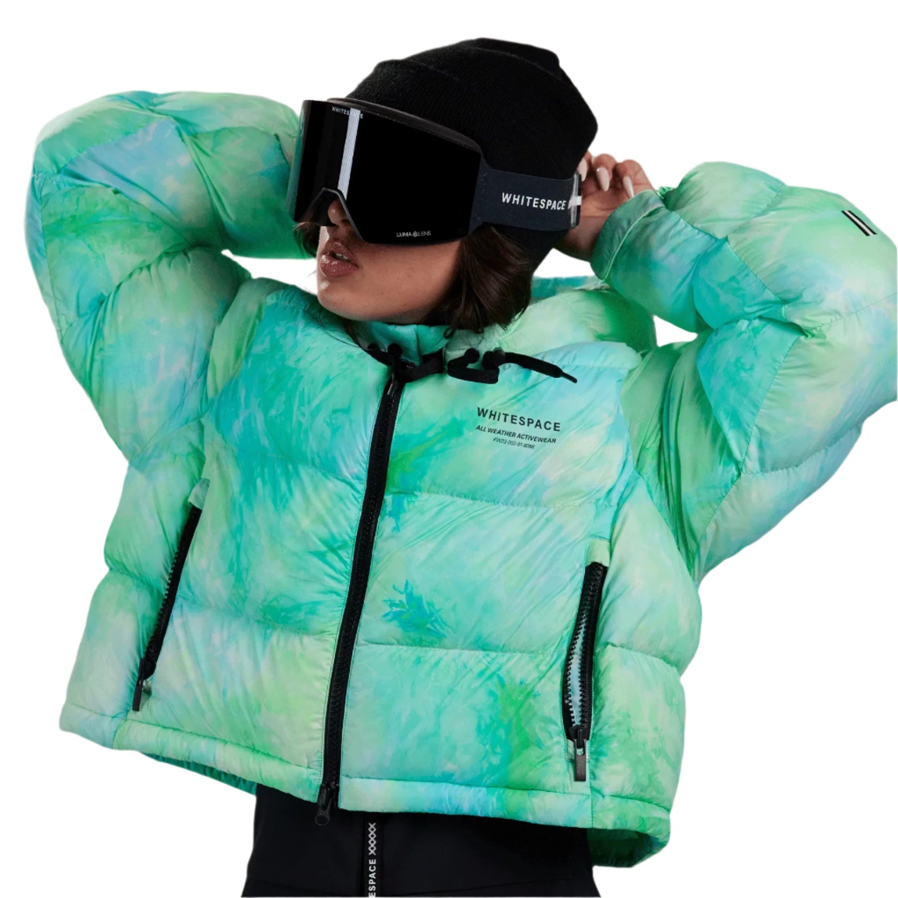 Whitespace Women's Cropped Puffer Jacket 2024 - A cropped, puffy jacket with a high collar and zippered pockets on both sides. The jacket is light green with darker green accents.