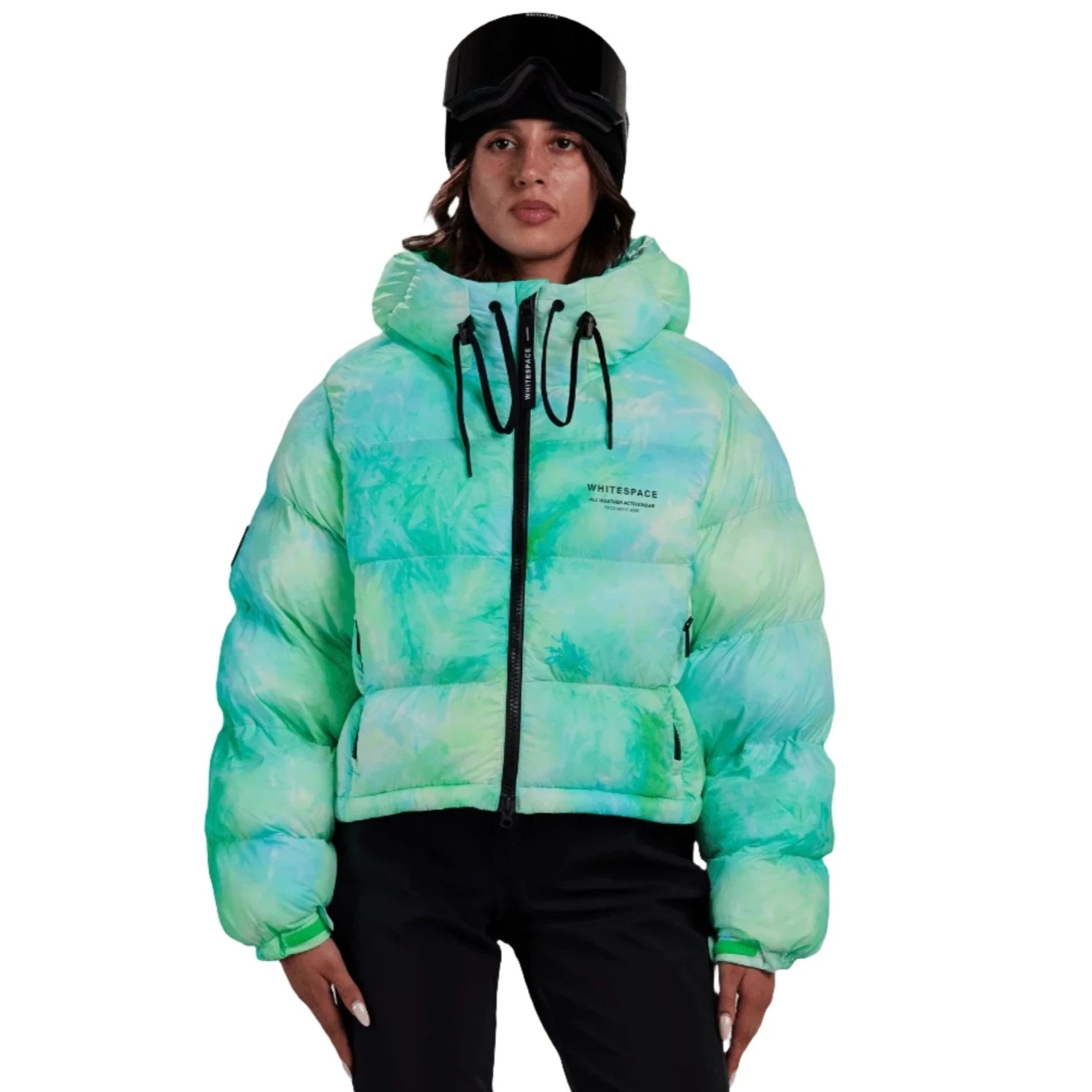 Whitespace Women's Cropped Puffer Jacket 2024 - A cropped-length puffer jacket with a hood, featuring a tie-dye pattern in shades of blue and green.