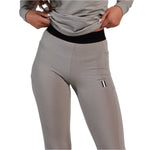 Whitespace Women's Graphene Midweight Base Layer Bottom 2024 - A pair of women's base layer bottoms in a light grey color with thin white stripes.