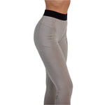 Whitespace Women's Graphene Midweight Base Layer Bottom 2024 - A pair of light gray base layer bottoms with a textured pattern and a black waistband.