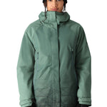 The 686 brand's Fantasia Insulated Jacket 2025 is primarily sage green with a darker sage green pattern on the lower front portion.