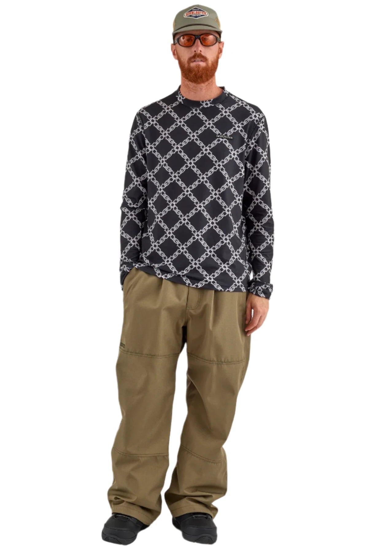 Airblaster Wrench Shell Pant 2025 - A pair of khaki-colored pants with a repeating pattern of white wrenches and bolts.