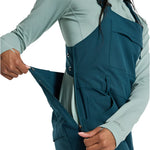 Burton Women's Avalon Stretch 2L Bib Pant 2025 - A pair of dark blue snow pants with a zippered fly and adjustable straps on the bib portion.