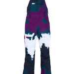 Burton Women's Avalon Stretch 2L Bib Pant 2025 - A pair of purple snow pants with a white logo on the left thigh and black hardware.
