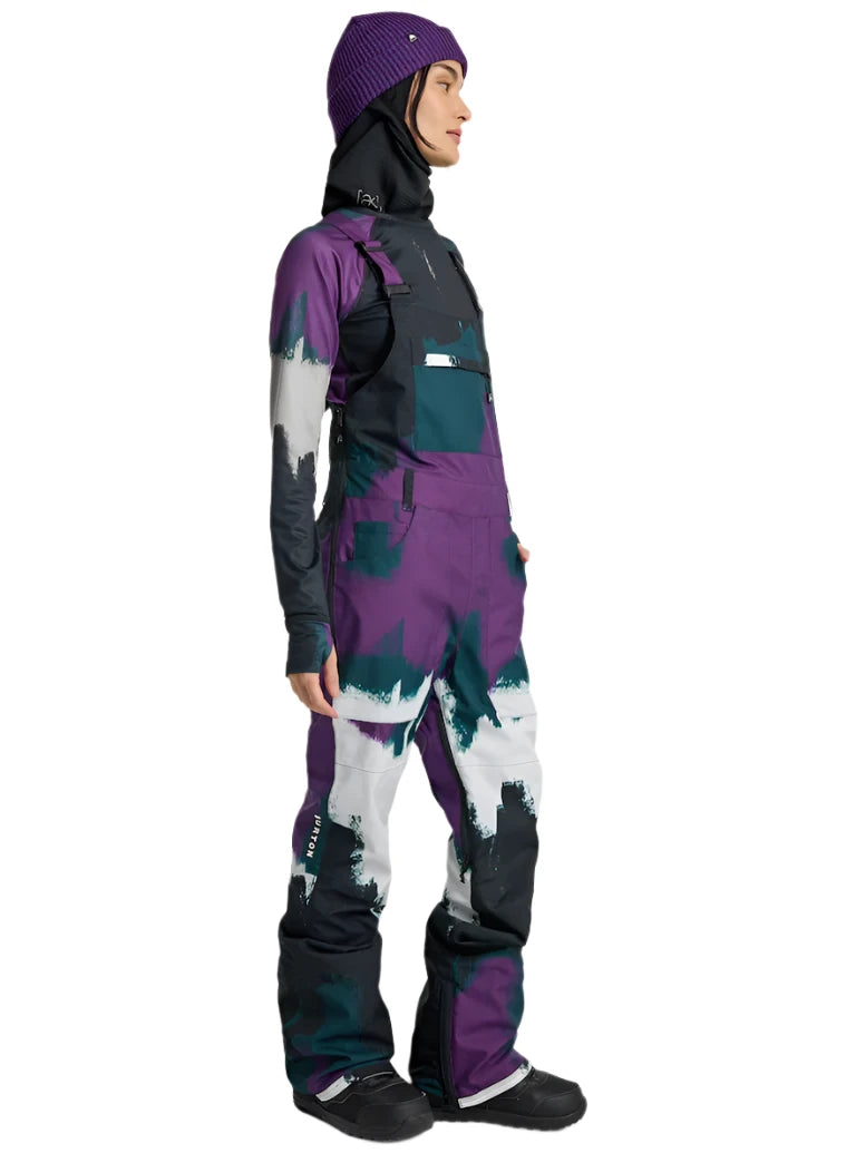 Burton Women's Avalon Stretch 2L Bib Pant 2025 - Black bib pant with white and purple accents, featuring a stretchy material.