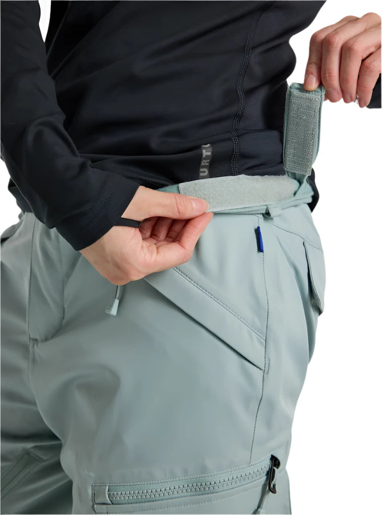 Burton Women's Gloria 2L Stretch Pants 2025 - A pair of light gray snow pants with a subtle pattern and zippered pockets.