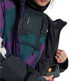 Burton Women's Lalik 2L Jacket - A purple and green camouflage patterned jacket with a black zipper on the chest pocket.