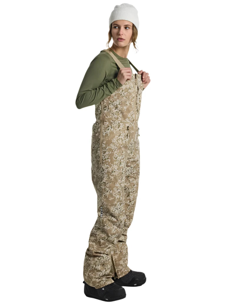 Burton Women's Reserve 2L Stretch Bib Pants 2025 - A pair of khaki-colored snow pants with a subtle floral pattern and adjustable straps.