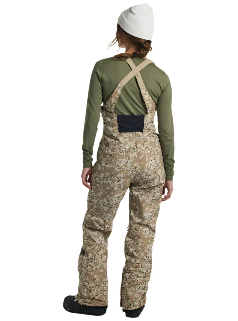 Burton Women's Reserve 2L Stretch Bib Pants 2025 - A pair of khaki-colored snow pants with a subtle floral pattern and black accents on the side pockets.