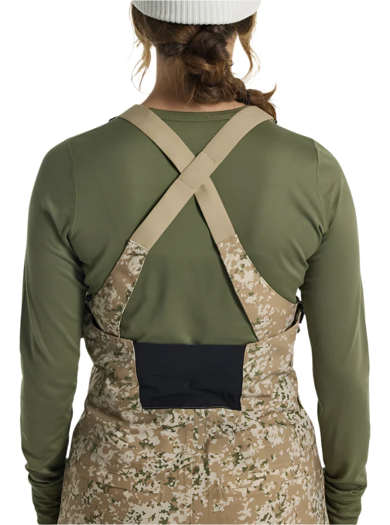 Burton Women's Reserve 2L Stretch Bib Pants 2025 - A pair of khaki-colored snow pants with a subtle floral pattern and black hardware.