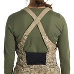 Burton Women's Reserve 2L Stretch Bib Pants 2025 - A pair of khaki-colored snow pants with a subtle floral pattern and black hardware.