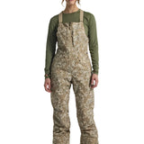 Burton Women's Reserve 2L Stretch Bib Pants 2025 - A pair of khaki-colored snow pants with a subtle floral pattern and adjustable straps.