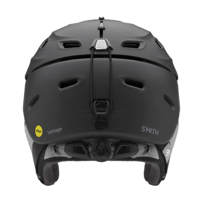 Smith Women's Vantage MIPS Helmet - A black helmet with a white logo on the front and a strap at the back.