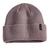 Autumn Select Beanie 2025 - A light brown beanie with a ribbed texture and a folded cuff at the bottom.