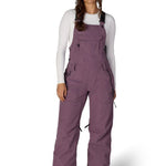 Women’s insulated bib overalls in mauve purple with front pockets and adjustable straps.