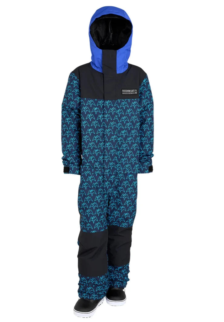 Airblaster Junior's Freedom Insulated Suit 2025 - A navy blue snowsuit with a repeating pattern of light teal mountain peaks and trees, featuring black accents on the shoulders and chest.