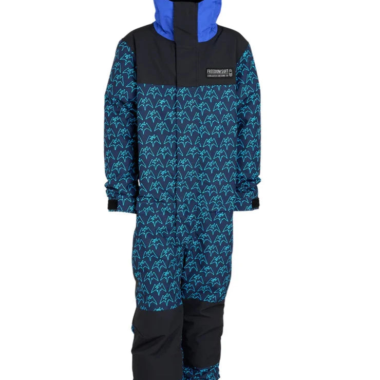 Airblaster Junior's Freedom Insulated Suit 2025 - A navy blue snowsuit with a repeating pattern of light teal mountain peaks and trees, featuring black accents on the shoulders and chest.