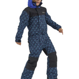 Airblaster Junior's Freedom Insulated Suit 2025 - A navy blue snowsuit with a repeating pattern of light blue mountain peaks and trees, featuring black accents on the shoulders and knees.