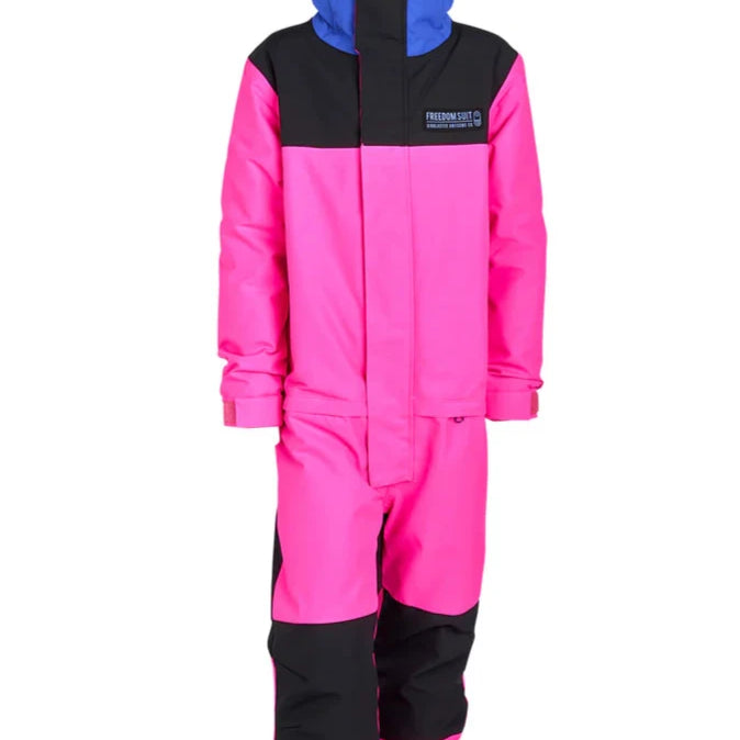 Airblaster Junior's Freedom Insulated Suit 2025 - A bright pink snowsuit with a black chest panel and blue hood, featuring a white logo on the left side of the chest.