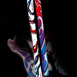 The image shows a pair of Salomon S/Lab QST Blank skis, which are designed for 2026. The skis have a vibrant and colorful design with multiple colors including red, blue, white, and black. They feature the brand name "Salomon" prominently displayed on them. These skis are likely intended for downhill skiing, given their shape and design.