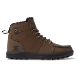 DC Woodland Boots 2024 - A pair of brown boots with a rugged sole and laces, featuring a small black logo on the side.