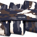 Close-up view of a camouflage-patterned belt in shades of blue, brown, and beige, showing a fabric tag with the word 'Arcade' stitched on it.