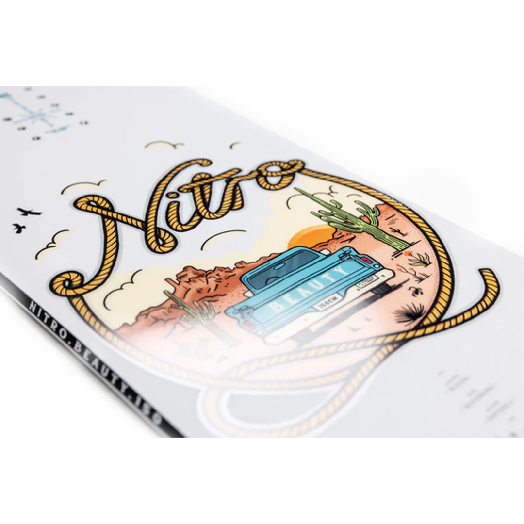 Nitro Women's Beauty Snowboard 2026 - A white snowboard with a blue graphic of a woman in a dress and hat, riding a horse on a sunny day.