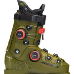 The image shows a pair of K2 Cortex 130 Zonal BOA ski boots for the year 2026. The boots are green and black, with white accents on the straps. They feature a zonal BOA closure system, which allows for adjustable fit and comfort. Additionally, there is a red tag attached to one of the boots, indicating it's new or has been recently purchased.