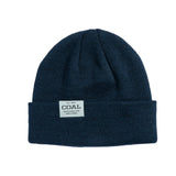 Coal Uniform Low Beanie 2025 - A navy blue beanie with a white rectangular label on the front that says "COAL" in black letters.