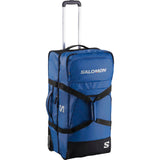 Salomon Race Trip Container 100L Bag 2025 - A large blue duffel bag with black trim and straps, featuring a zippered front pocket and two side pockets.