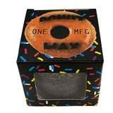 Oneball Shape Shifter Donuts Wax 2025 - A brown wax donut with a hole in the center, sitting on top of its black box.