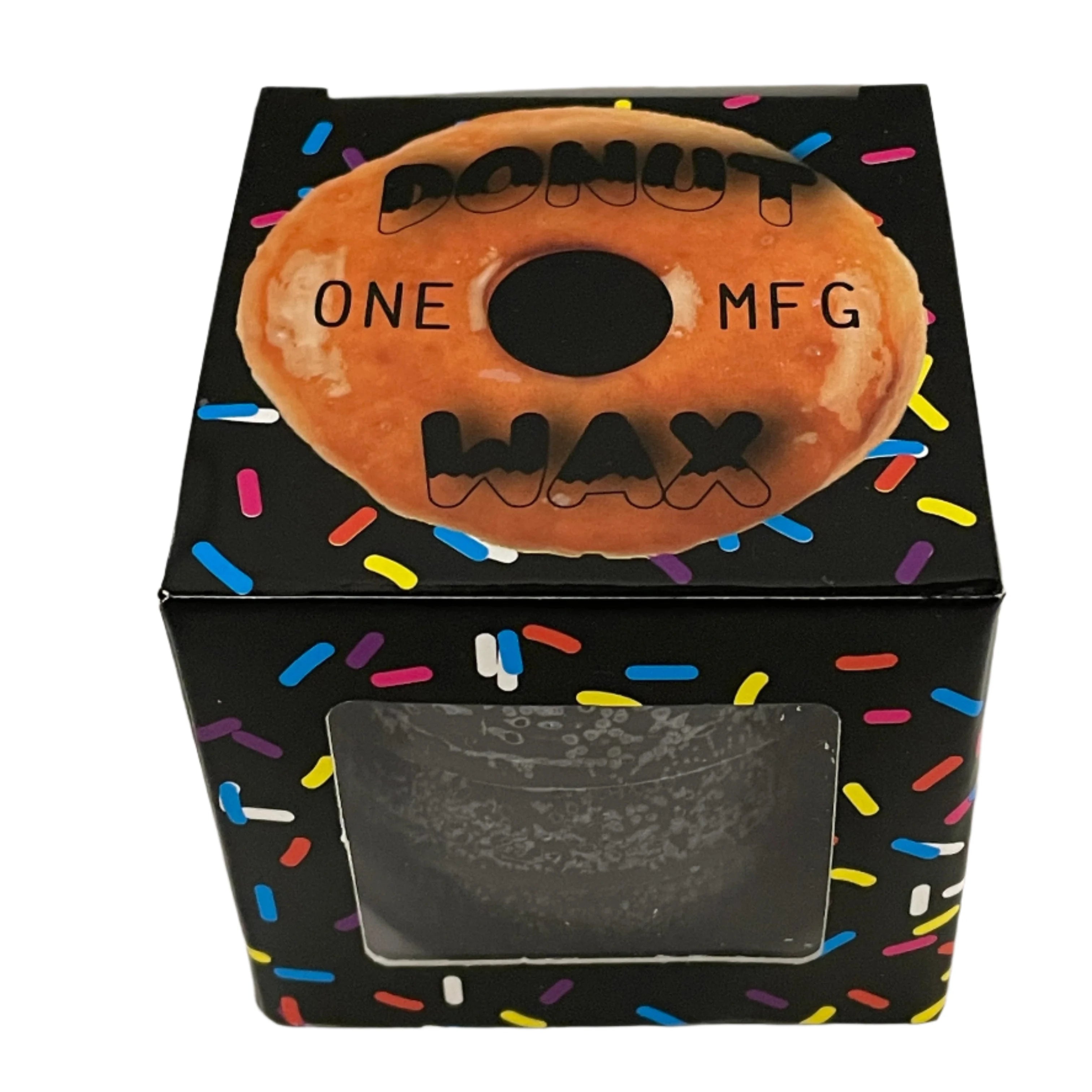 Oneball Shape Shifter Donuts Wax 2025 - A brown wax donut with a hole in the center, sitting on top of its black box.