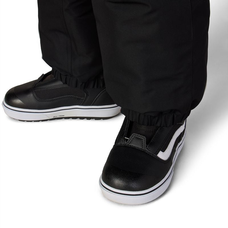 Black boys' shell pants with cuffed ankles and adjustable strap detail