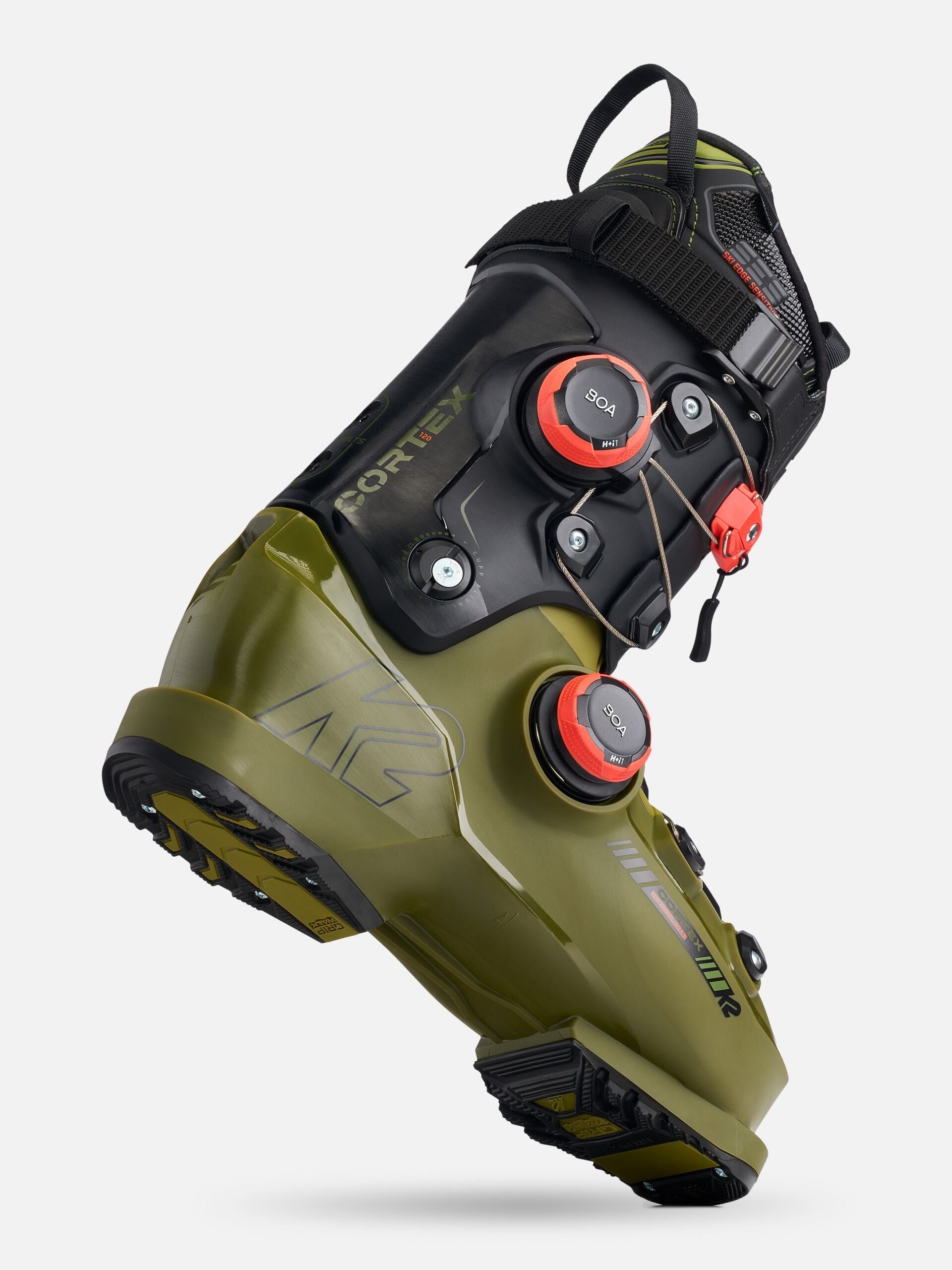 K2 Cortex 120 Zonal BOA ski boots feature a dark green color with red accents and a distinctive zonal design.