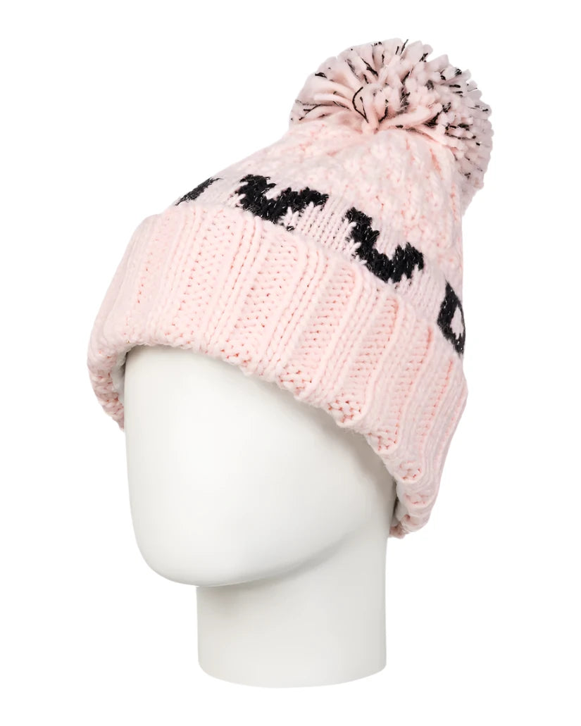 Roxy Junior's Tonic Beanie 2025 - A light pink beanie with a black logo on the front and a matching pom-pom on top.