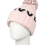 Roxy Junior's Tonic Beanie 2025 - A light pink beanie with a black logo on the front and a matching pom-pom on top.