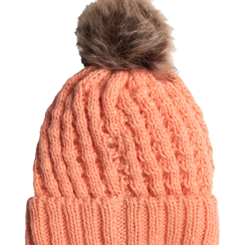 Roxy Junior's Blizzard Beanie 2025 - A salmon-colored beanie with a brown faux fur pom-pom on top.