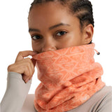 Roxy Women's Sayna Collar - A coral-colored fleece neck warmer with a subtle white geometric pattern.