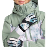 Roxy Women's Jetty Glove 2025 - A pair of gloves with a black strap and white snowflake pattern on the palm side.
