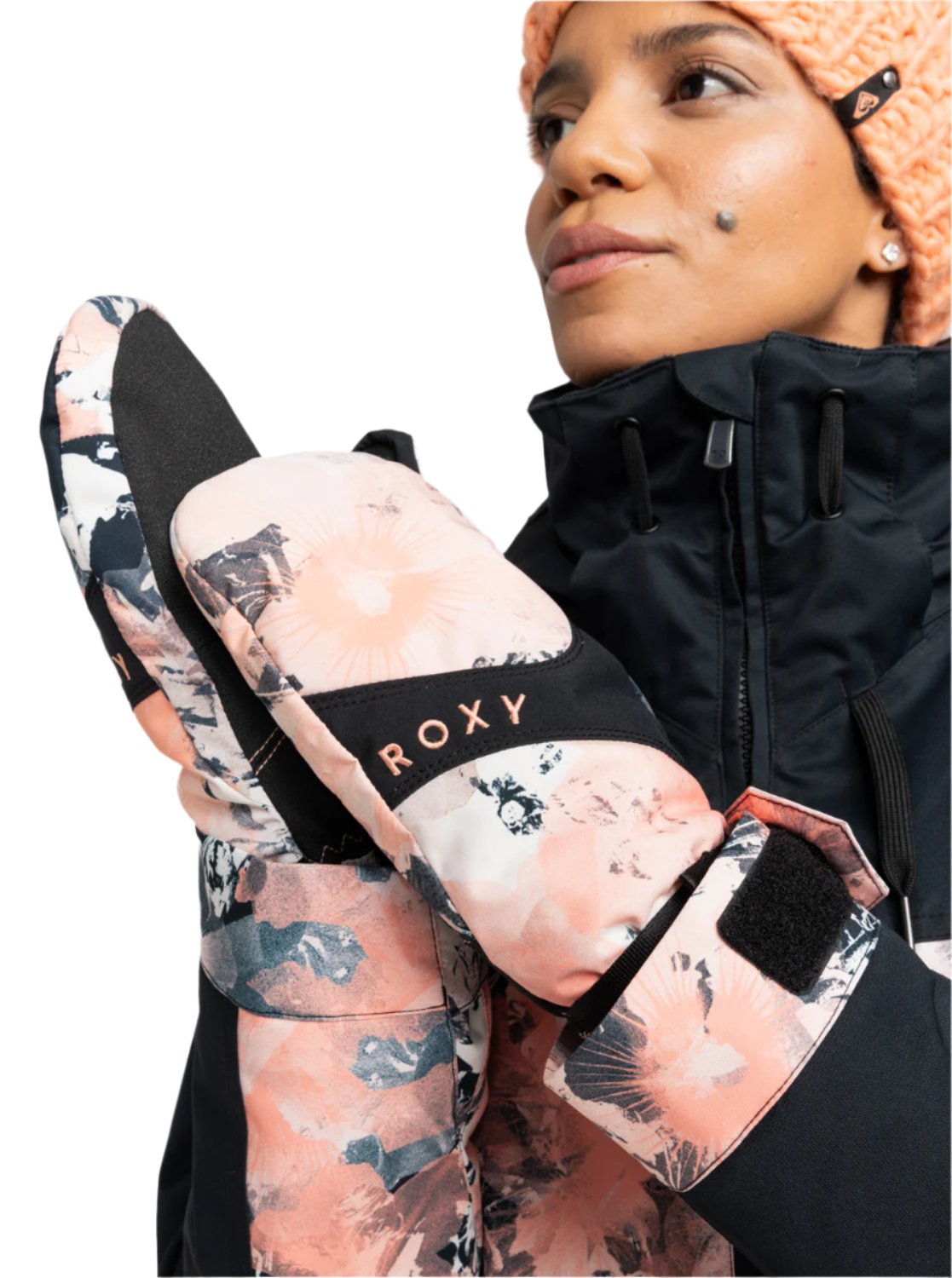 Roxy Women's Jetty Mitt - A pair of mitts with a pink and white abstract floral pattern on a light background.