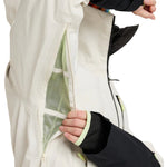 Roxy Women's Lunalite 3L GORE-TEX Jacket - A white jacket with a hood, featuring green accents and a zippered pocket on the left side.