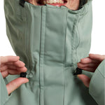 Roxy Women's Illumine Warmlink Jacket - A sage green jacket with a hood, featuring a zipper and two zippered pockets on either side.