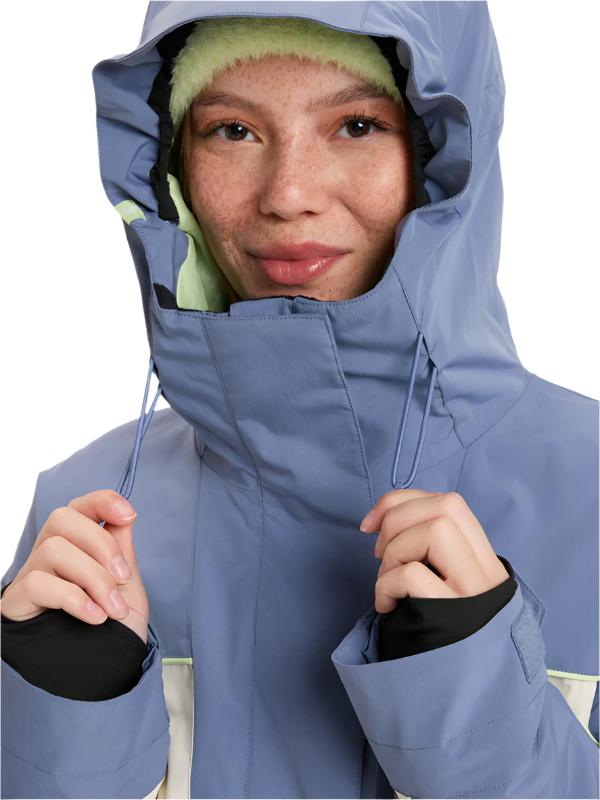 Roxy Women's Ritualized Insulated Jacket - A blue jacket with a fur-lined hood and zippered pockets.